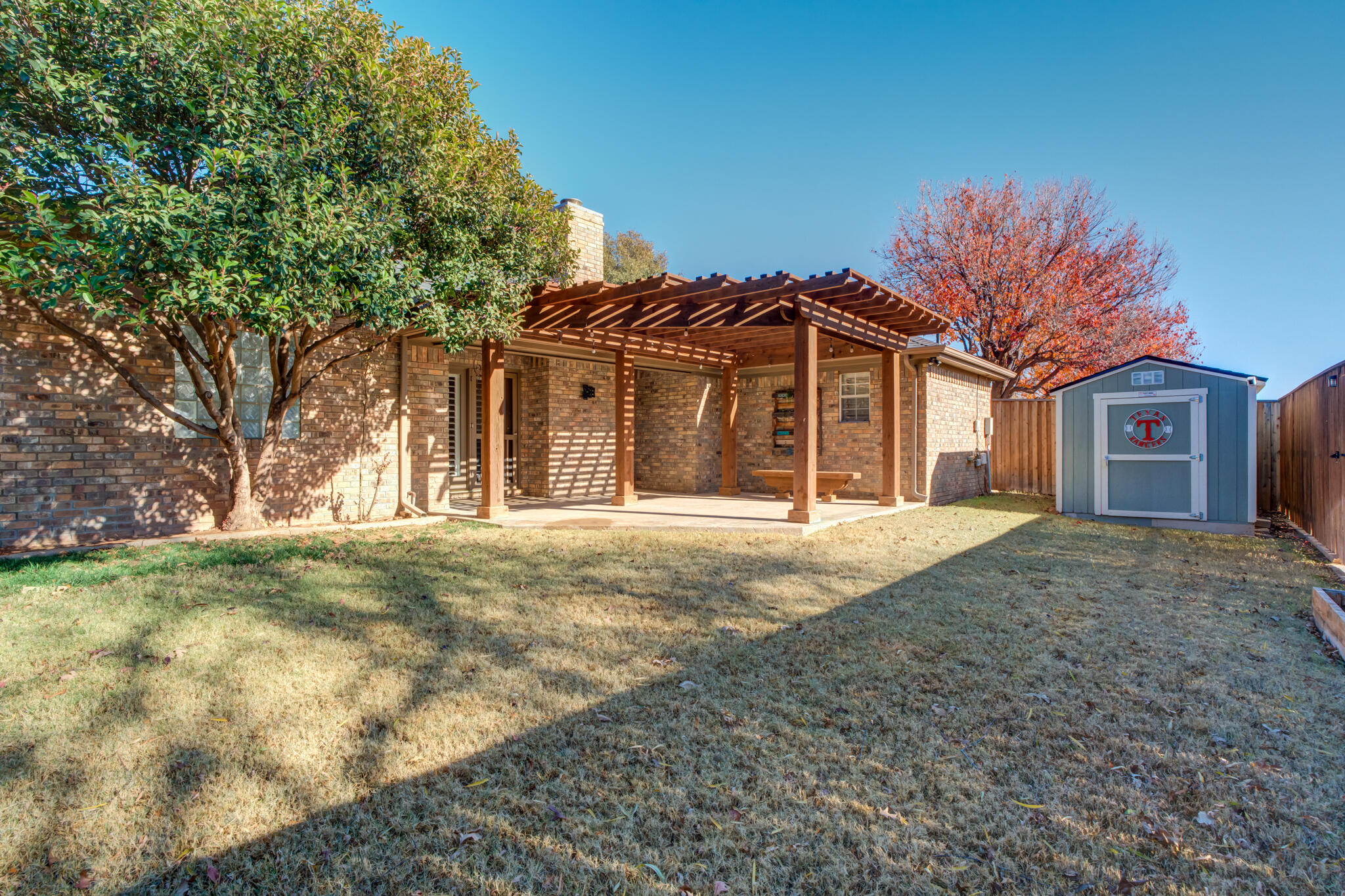 5407 68th Street Lubbock, TX 79424 - Photo 39 of 40 a view of a house with a yard