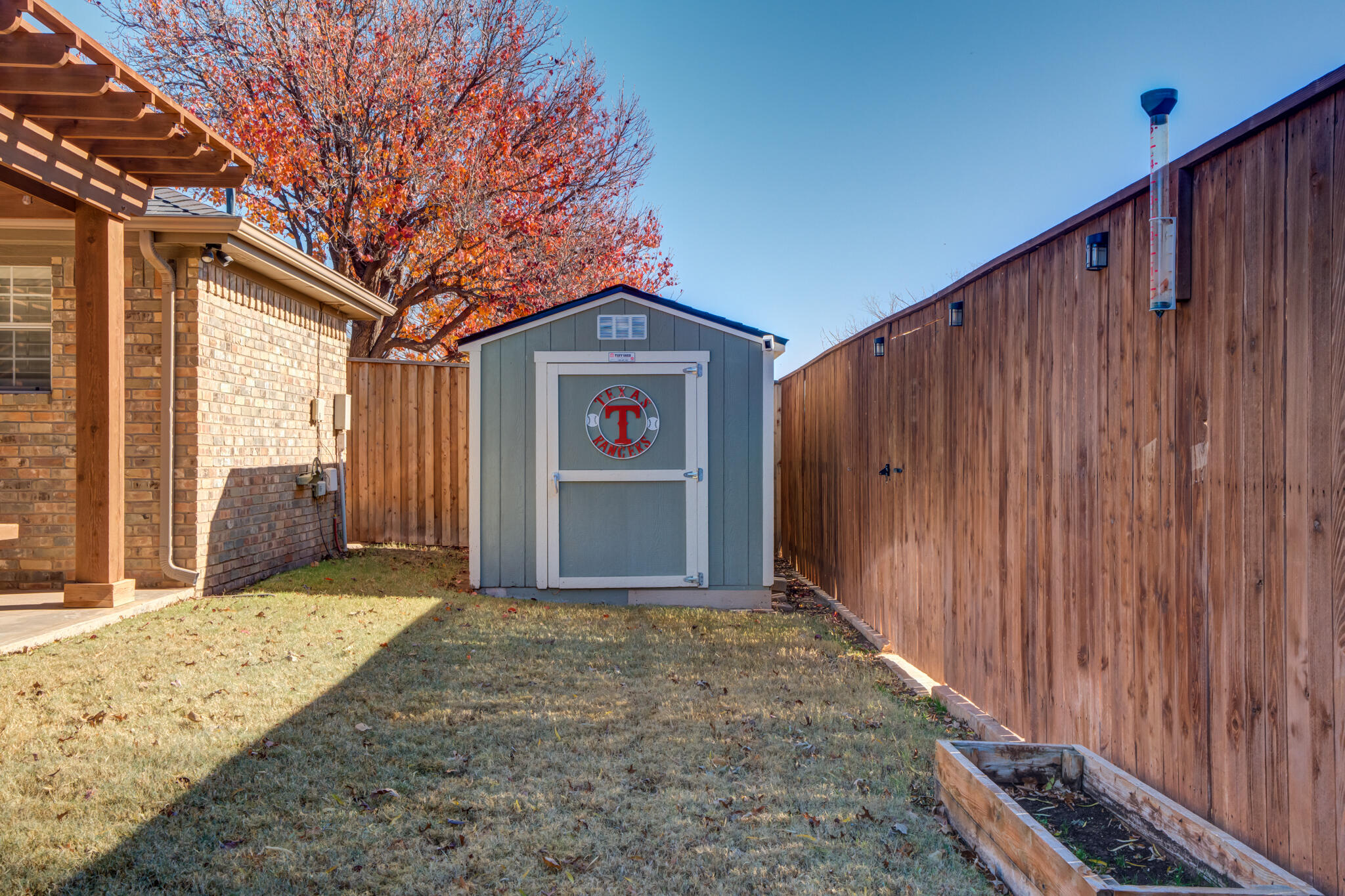 5407 68th Street Lubbock, TX 79424 - Photo 40 of 40 a view of entryway with wooden fence