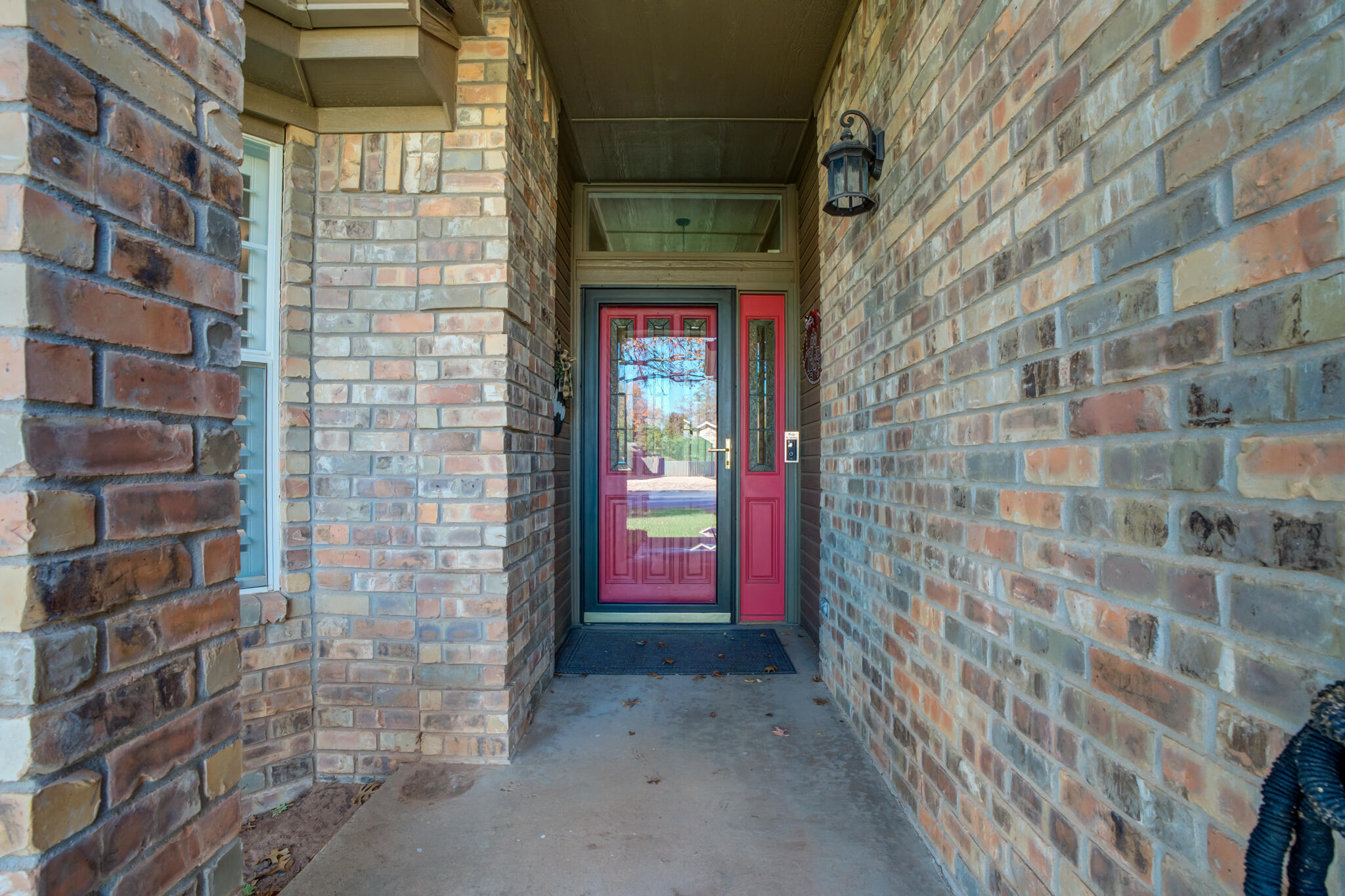 5407 68th Street Lubbock, TX 79424 - Photo 4 of 40 a view of a brick wall with an empty room