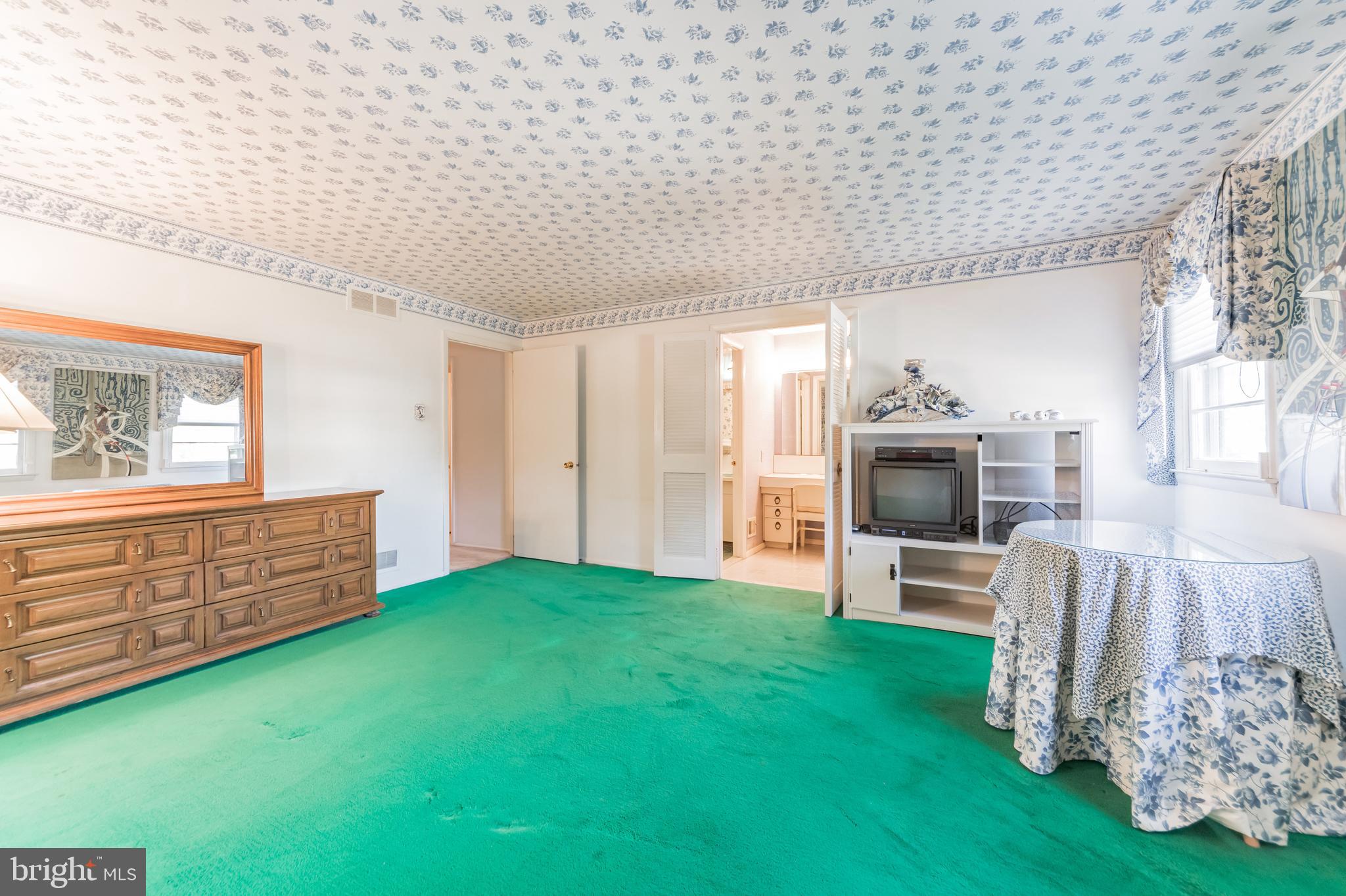 9667 Pine Road Philadelphia, PA 19115 - Photo 20 of 30 a view of living room with furniture and a fireplace