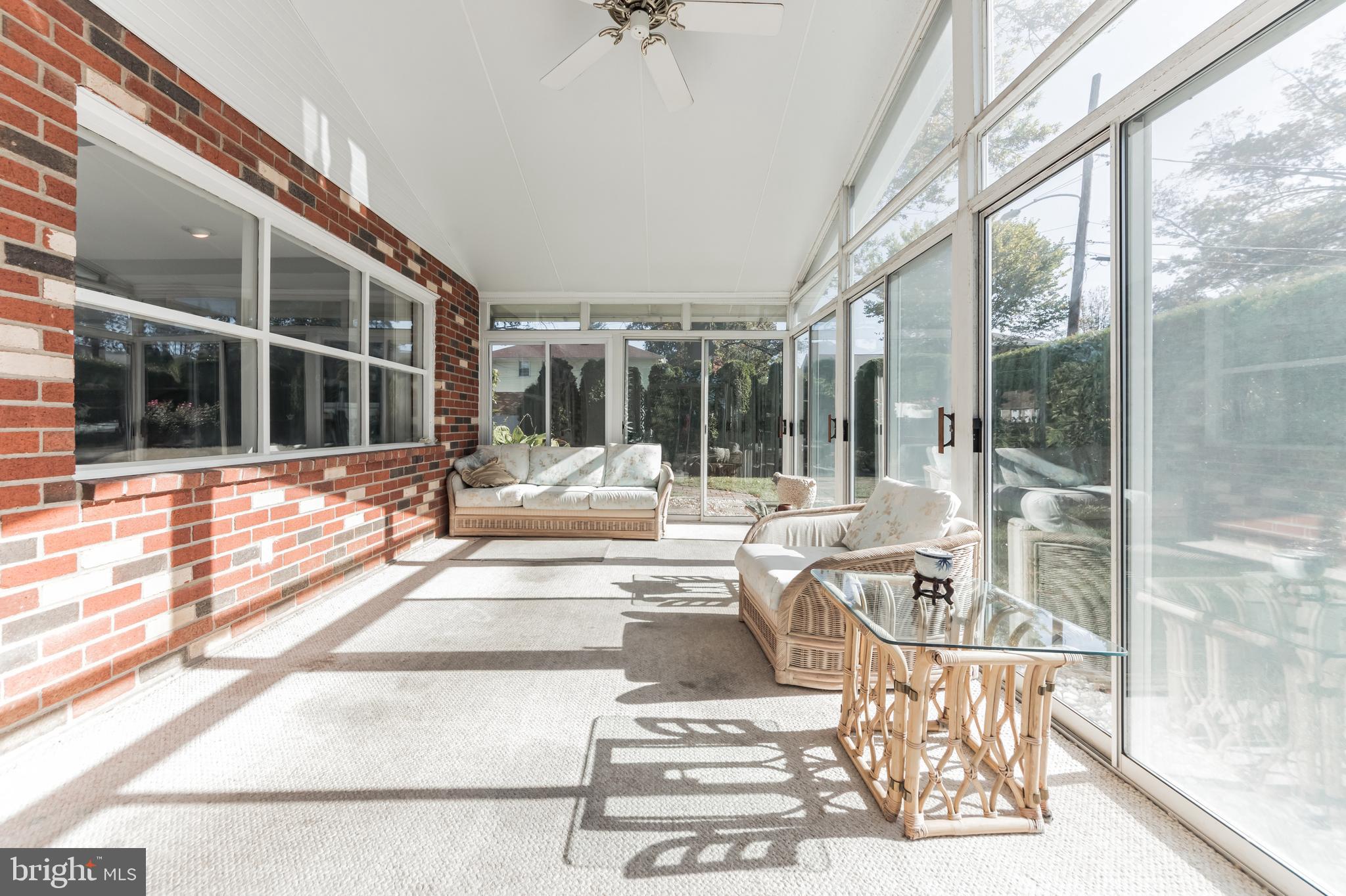 9667 Pine Road Philadelphia, PA 19115 - Photo 27 of 30 a view of a living room and a porch