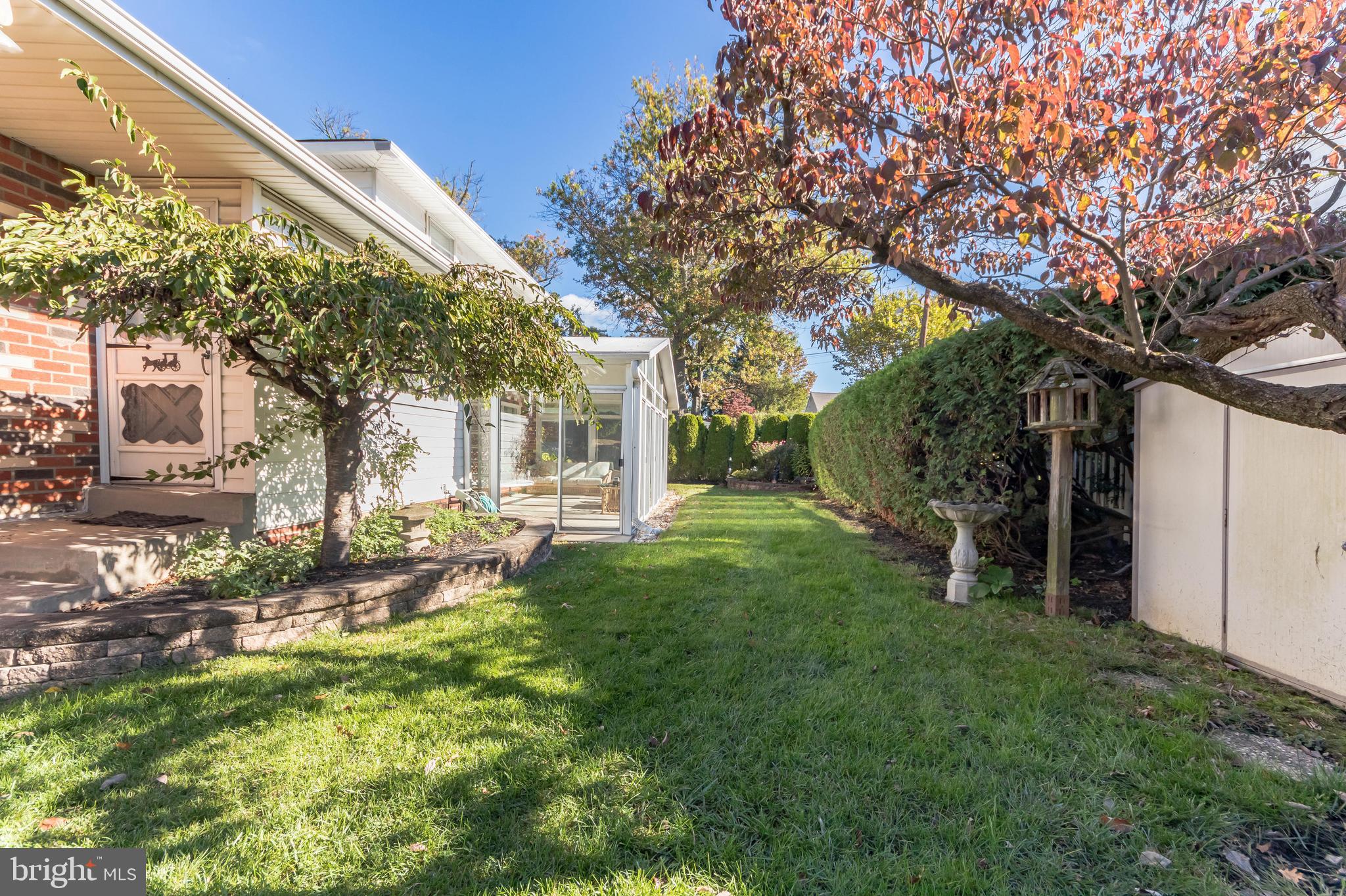 9667 Pine Road Philadelphia, PA 19115 - Photo 29 of 30 a view of a house with a backyard