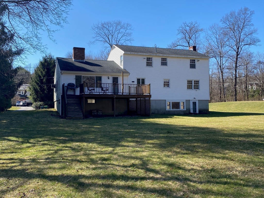307 Glen Road Weston, MA 02493 - Photo 14 of 14 a view of a house with a backyard