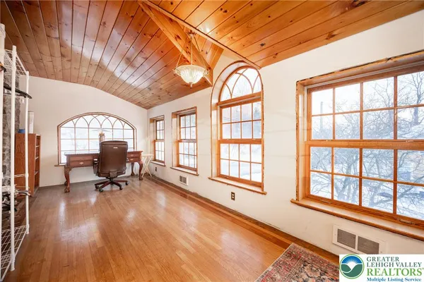 a view of a room with a large window