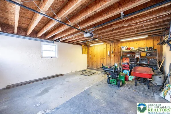 a view of a room with furniture and toys