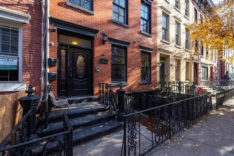 a view of a house with street