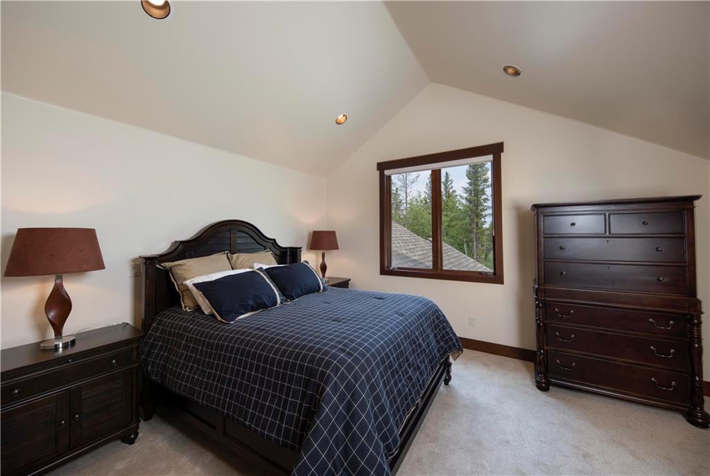 29 Rounds Road Breckenridge, CO 80424 - Photo 17 of 35 a bedroom with a bed and a dresser