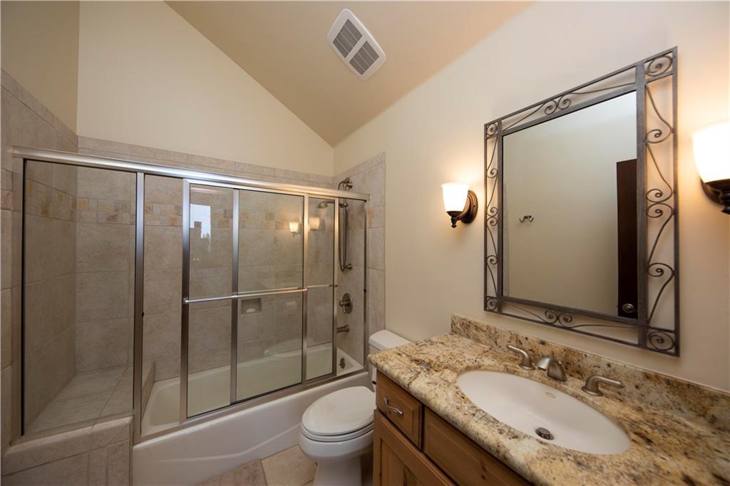 29 Rounds Road Breckenridge, CO 80424 - Photo 18 of 35 a bathroom with a granite countertop sink toilet and shower