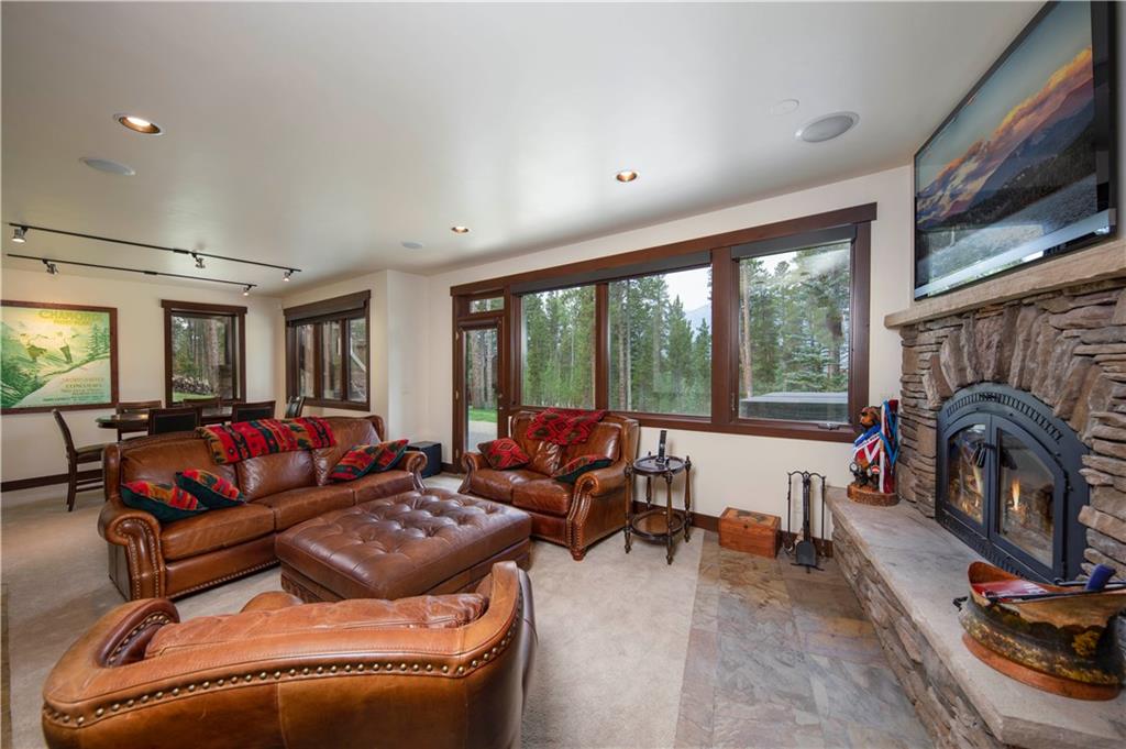 29 Rounds Road Breckenridge, CO 80424 - Photo 21 of 35 a living room with furniture and a fireplace