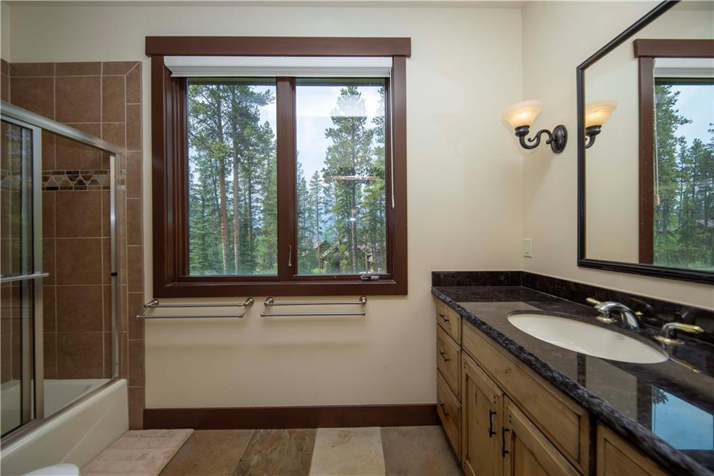 29 Rounds Road Breckenridge, CO 80424 - Photo 30 of 35 a bathroom with a sink and a mirror