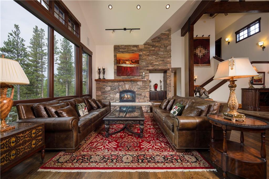 29 Rounds Road Breckenridge, CO 80424 - Photo 4 of 35 a living room with furniture and a fireplace