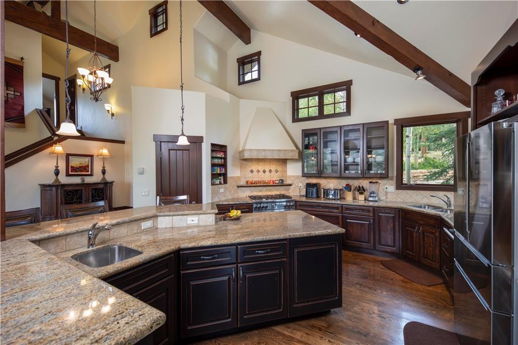29 Rounds Road Breckenridge, CO 80424 - Photo 6 of 35 a kitchen with stainless steel appliances granite countertop a sink and a stove