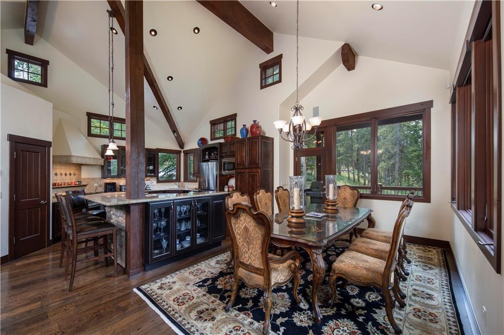 29 Rounds Road Breckenridge, CO 80424 - Photo 8 of 35 a view of a dining room with furniture window and wooden floor
