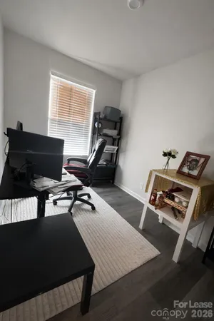 a room with furniture and a window