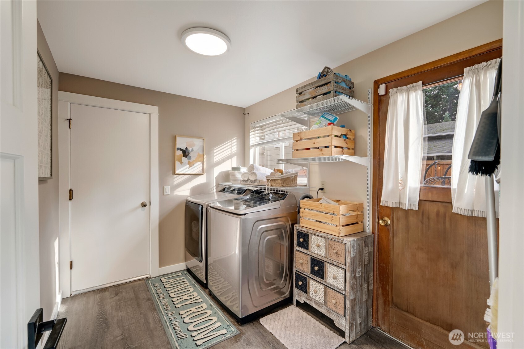 8804 209th Place Southwest Edmonds, WA 98026 - Photo 11 of 35 a kitchen with a stove and a refrigerator