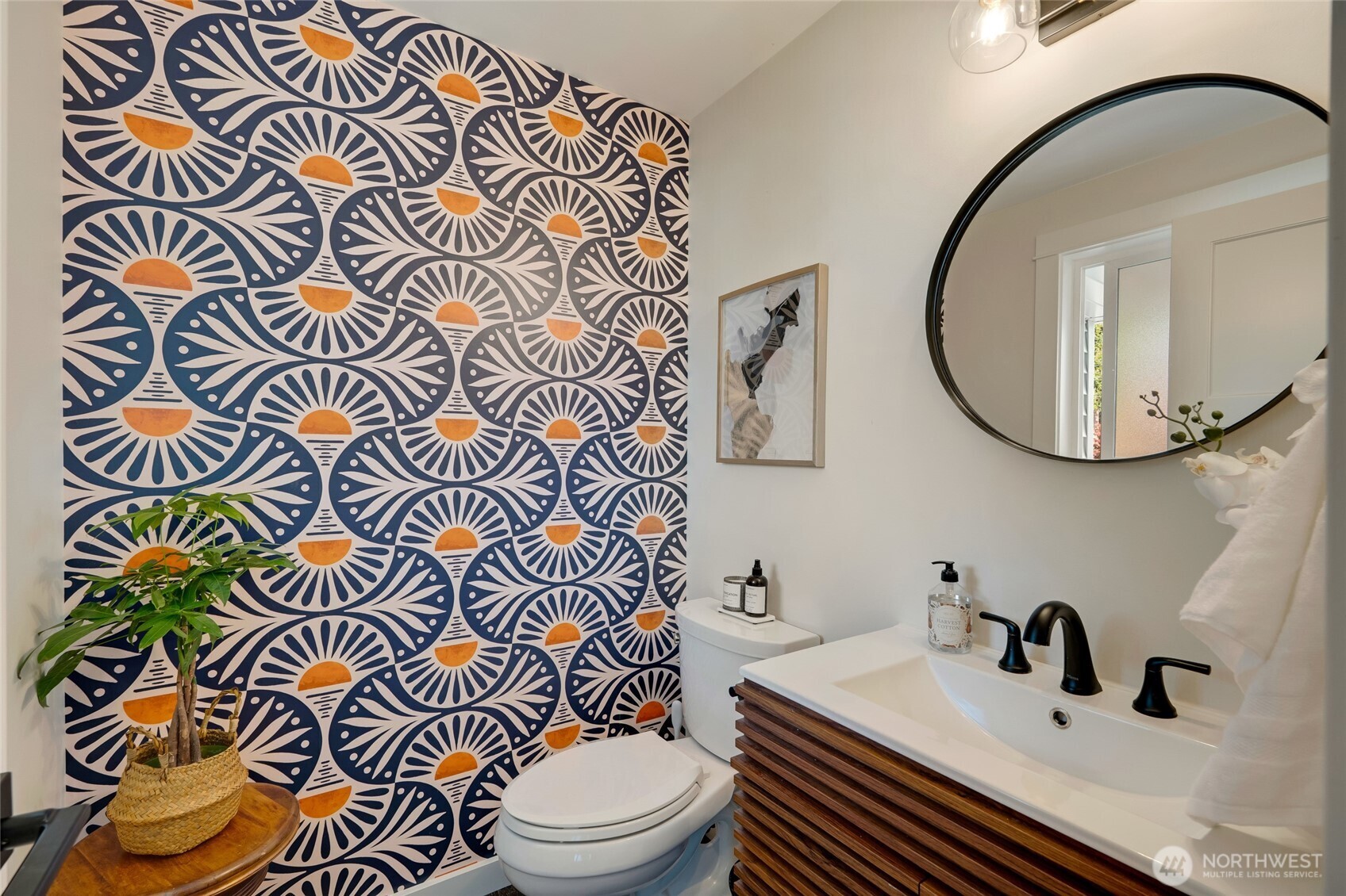8804 209th Place Southwest Edmonds, WA 98026 - Photo 12 of 35 a bathroom with a sink mirror vanity and toilet