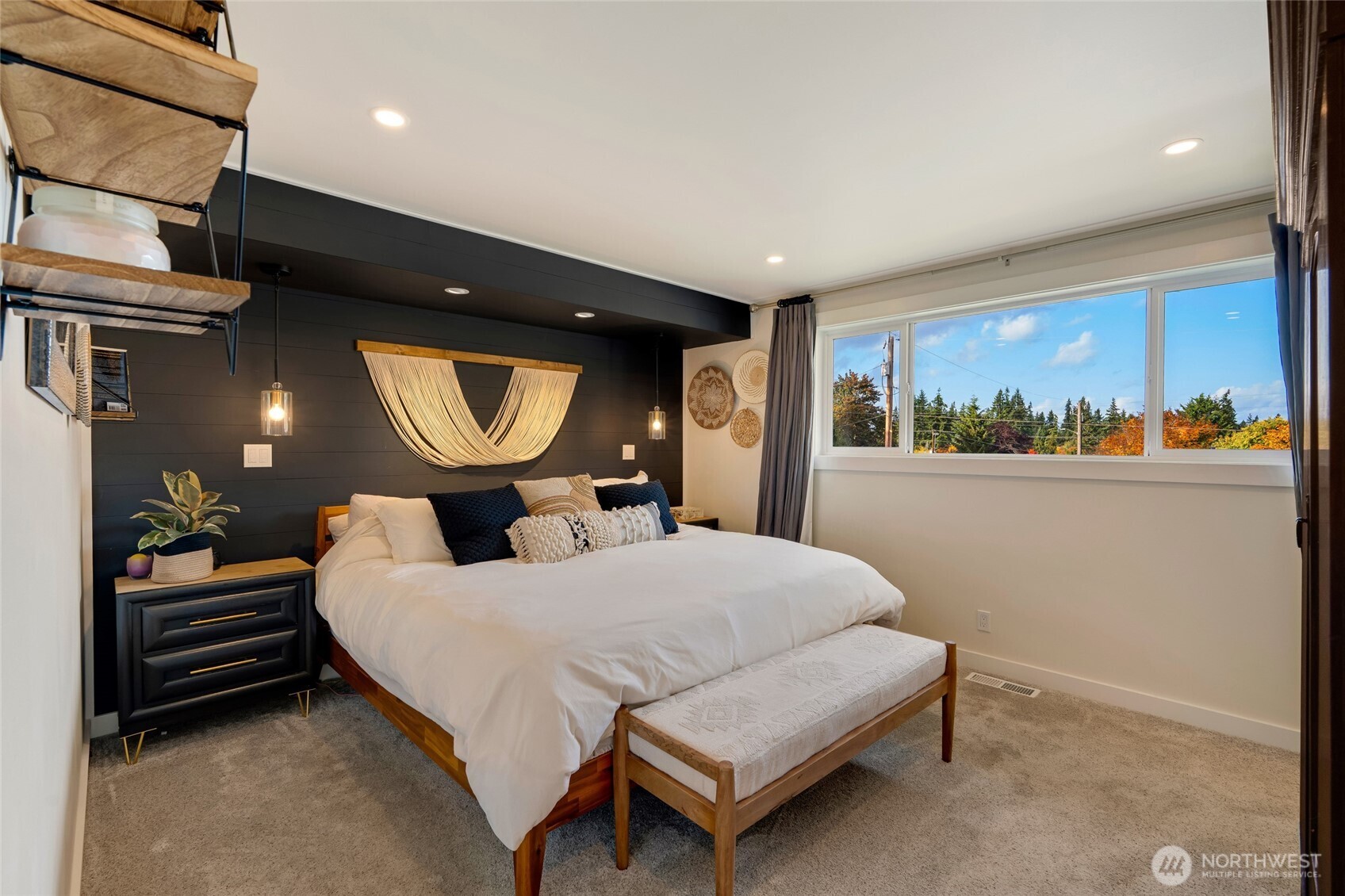 8804 209th Place Southwest Edmonds, WA 98026 - Photo 16 of 35 a bed room with a bed and a painting on the wall