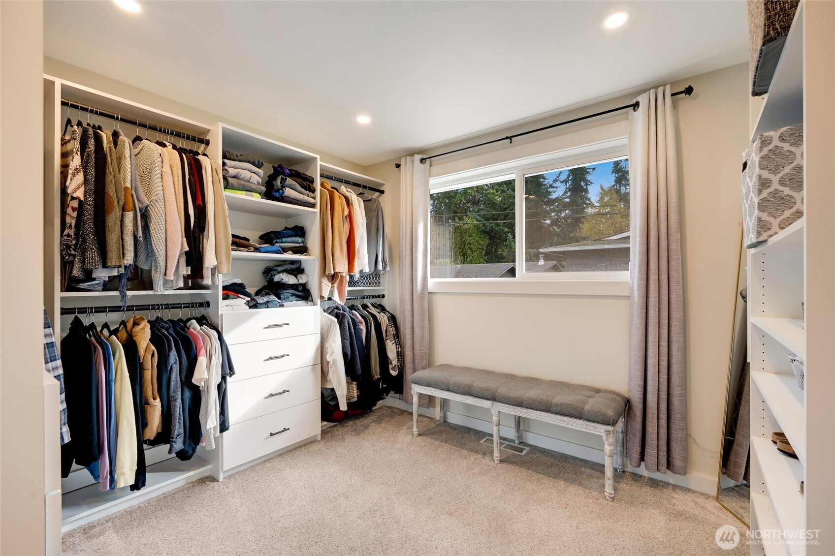 8804 209th Place Southwest Edmonds, WA 98026 - Photo 18 of 35 a view of walk in closet with clothes and shoes