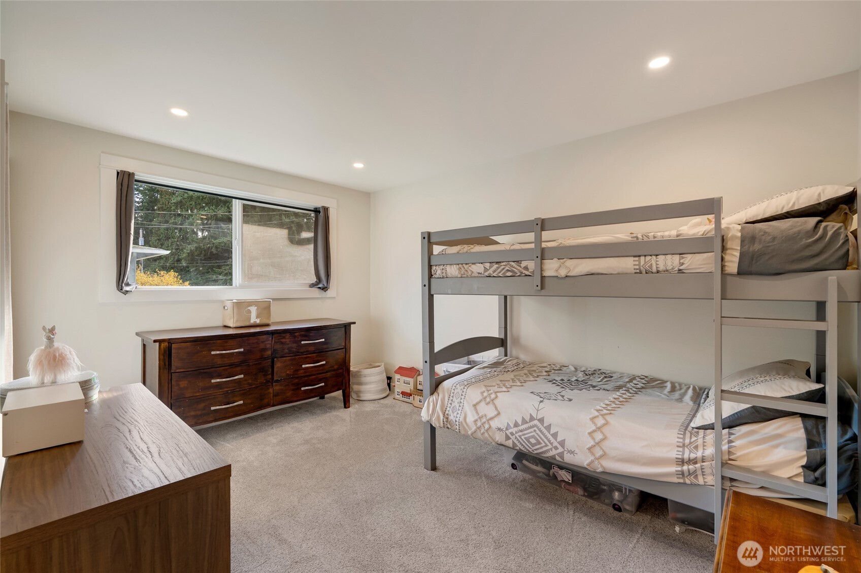 8804 209th Place Southwest Edmonds, WA 98026 - Photo 19 of 35 a bedroom with a bed and a dresser