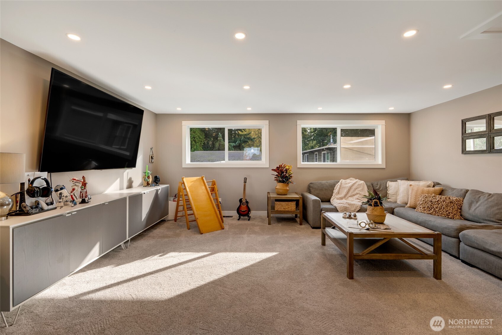 8804 209th Place Southwest Edmonds, WA 98026 - Photo 21 of 35 a living room with furniture and a flat screen tv