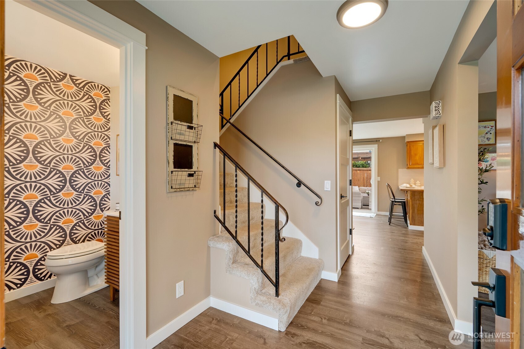 8804 209th Place Southwest Edmonds, WA 98026 - Photo 3 of 35 a view of a hallway with wooden floor and entryway