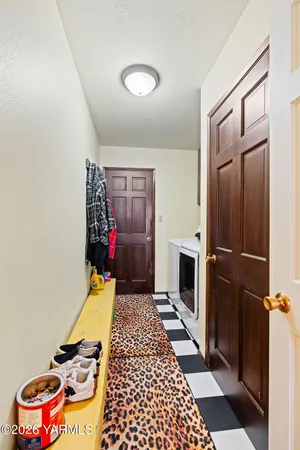 a room with furniture and a fireplace