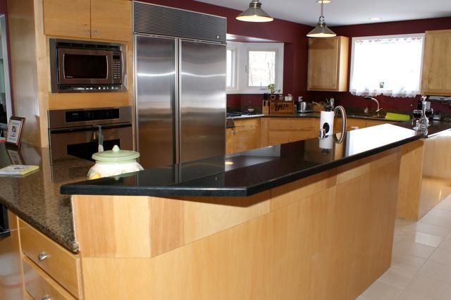 5N565 Billy Burns Road Wayne, IL 60184 - Photo 7 of 25 a kitchen with kitchen island a sink and a refrigerator
