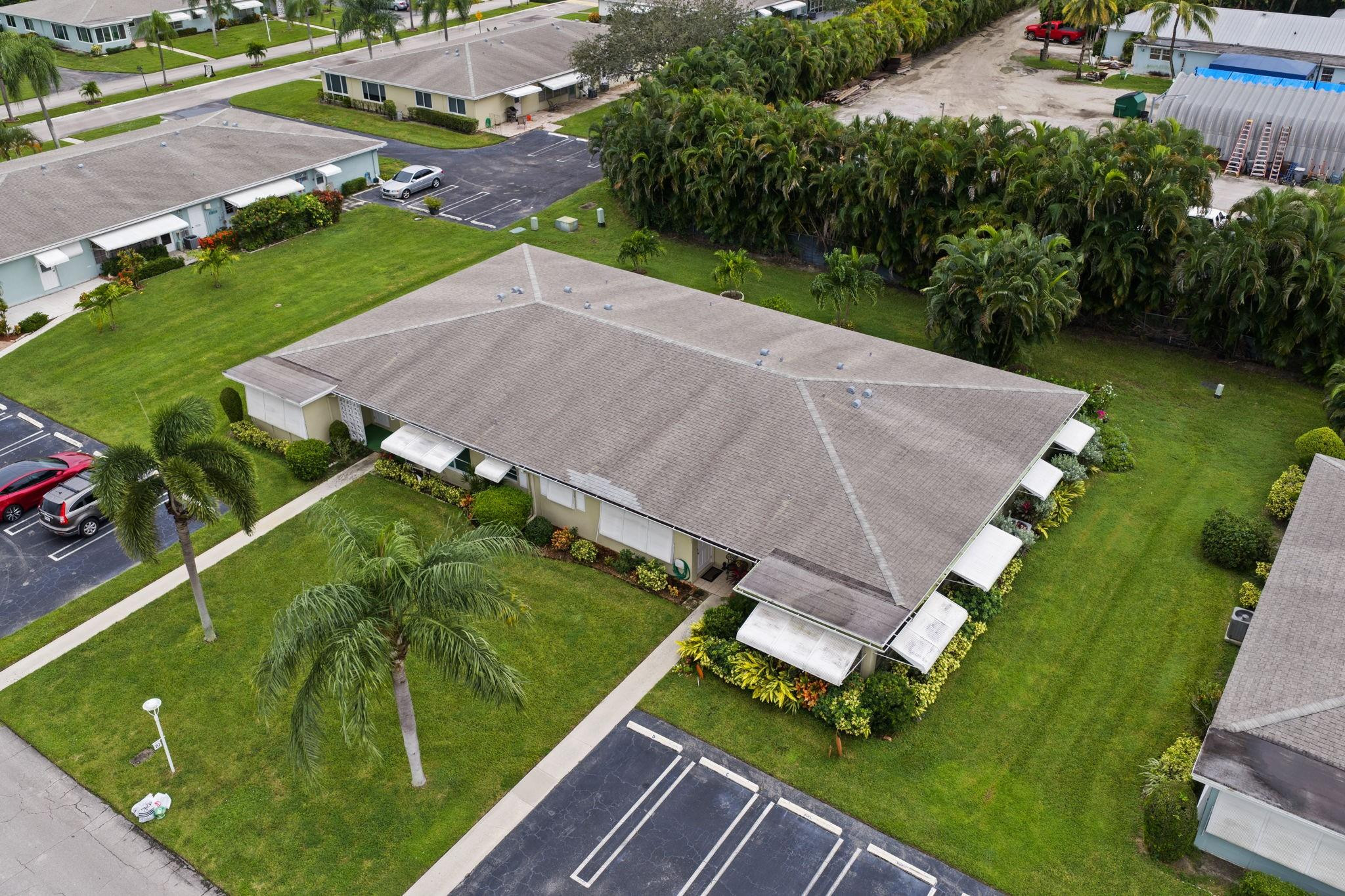152 High Point Boulevard, Unit D Delray Beach, FL 33445 - Photo 30 of 34 an aerial view of a house