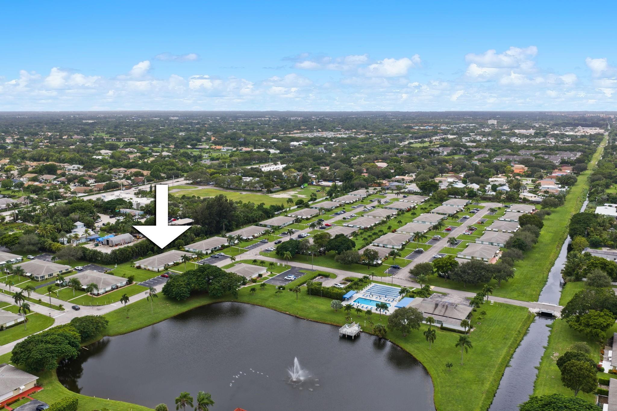 152 High Point Boulevard, Unit D Delray Beach, FL 33445 - Photo 31 of 34 an aerial view of a city with lots of residential buildings