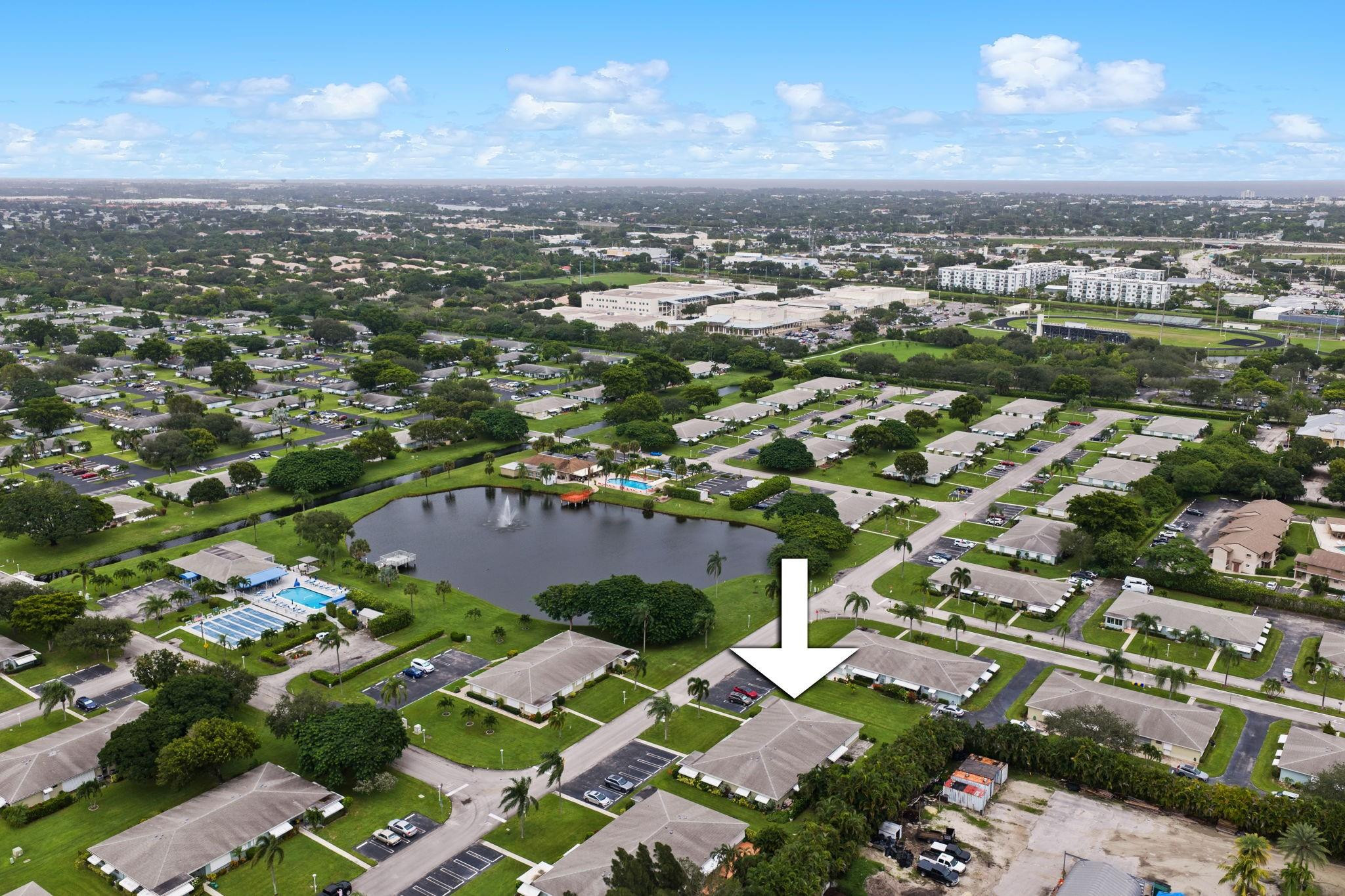 152 High Point Boulevard, Unit D Delray Beach, FL 33445 - Photo 32 of 34 an aerial view of residential houses with city view