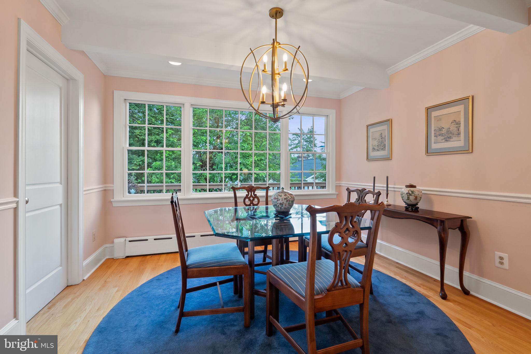 1703 Russell Road Alexandria, VA 22301 - Photo 11 of 42 a view of a dining room with furniture window and wooden floor