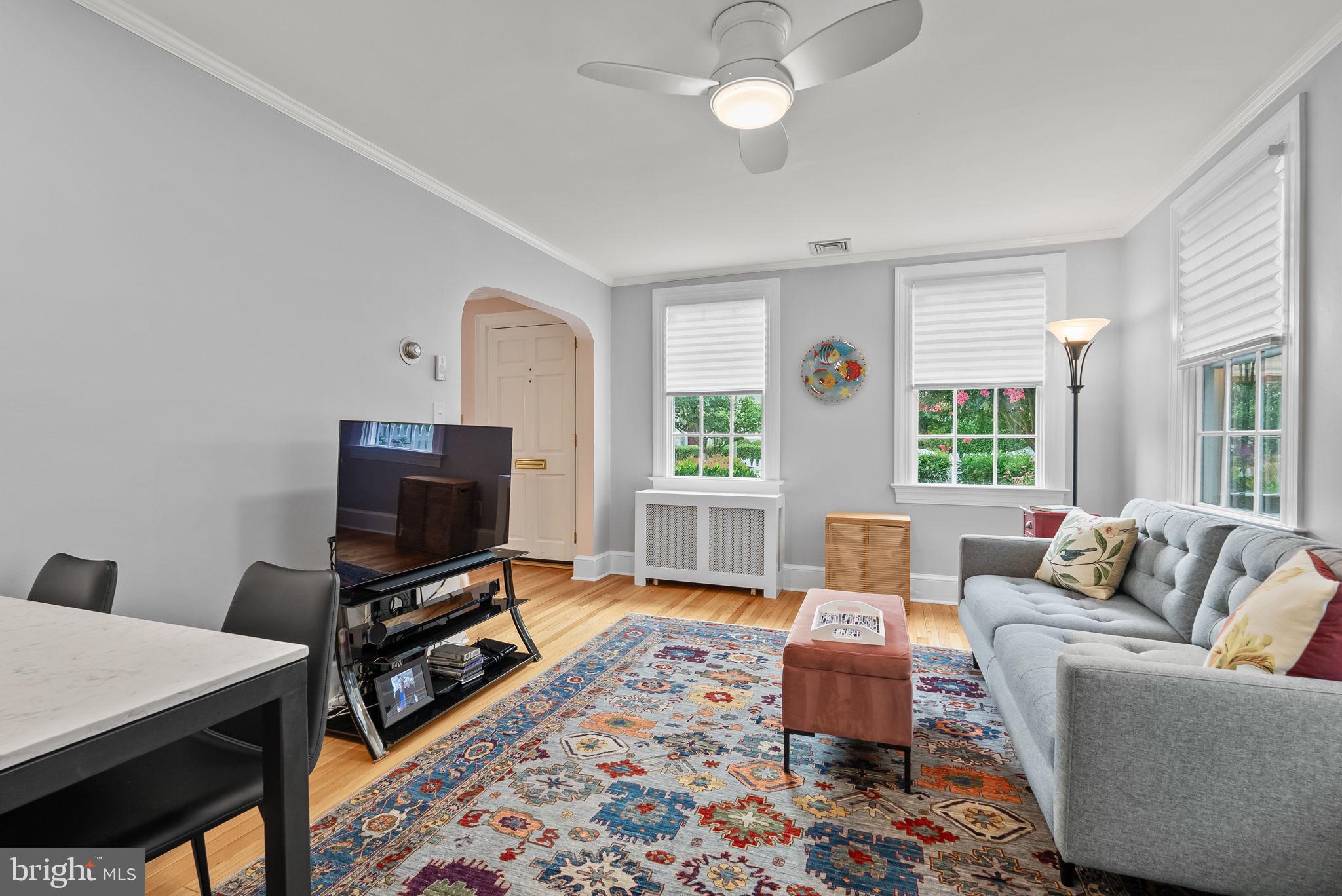 1703 Russell Road Alexandria, VA 22301 - Photo 13 of 42 a living room with furniture and a flat screen tv