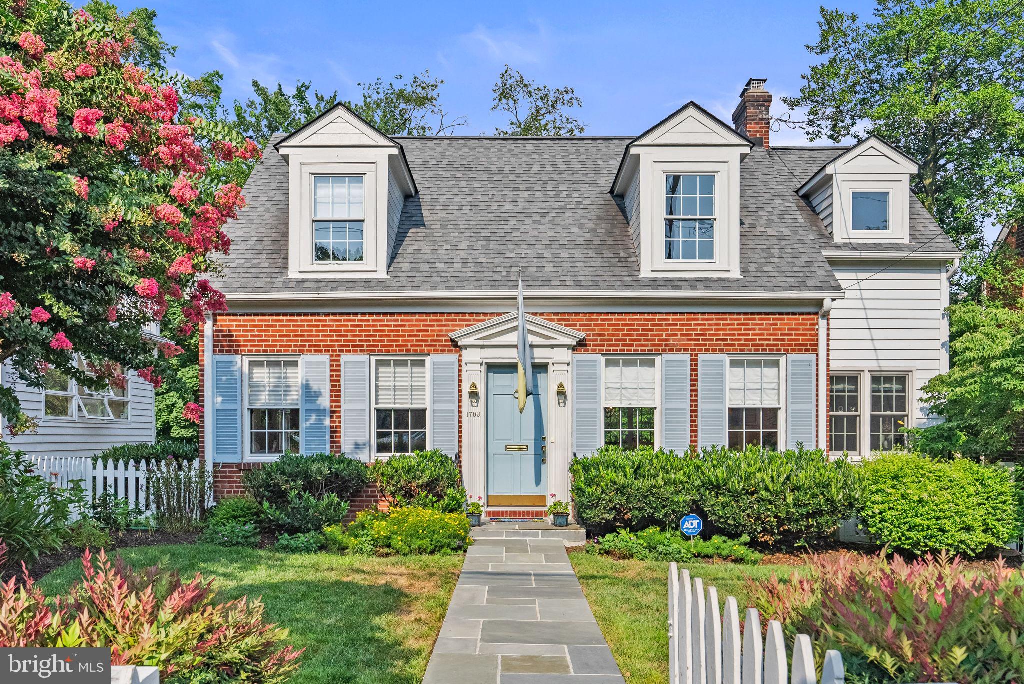 1703 Russell Road Alexandria, VA 22301 - Photo 2 of 42 front view of a house with a yard