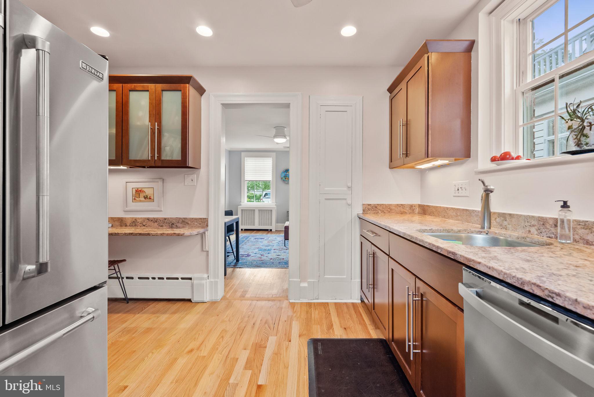 1703 Russell Road Alexandria, VA 22301 - Photo 23 of 42 a kitchen with granite countertop a sink and a stove top oven