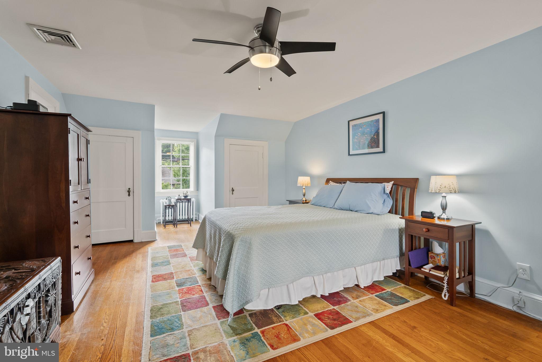 1703 Russell Road Alexandria, VA 22301 - Photo 26 of 42 a bed room with a bed and a chandelier