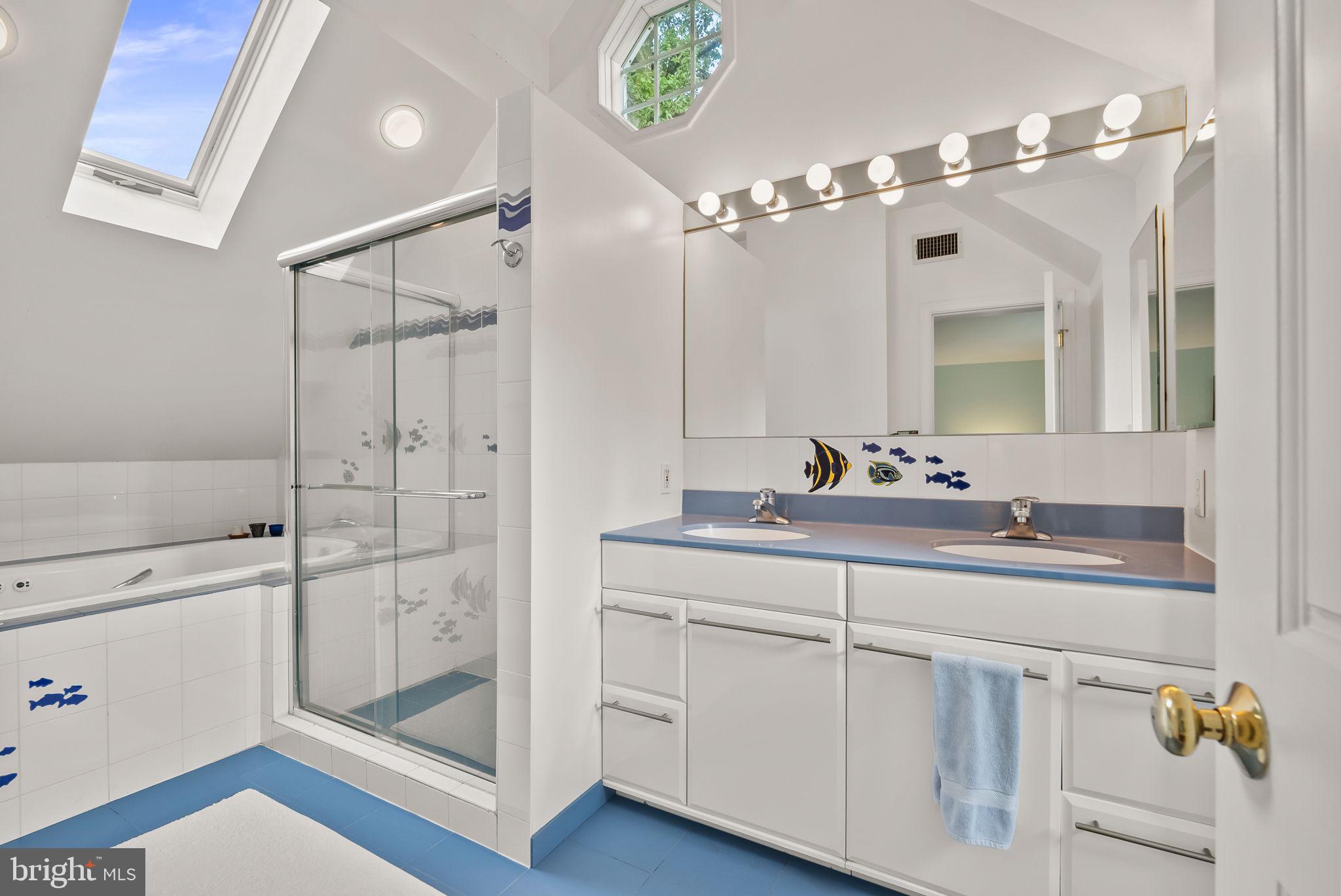 1703 Russell Road Alexandria, VA 22301 - Photo 28 of 42 a bathroom with a shower sink and mirror