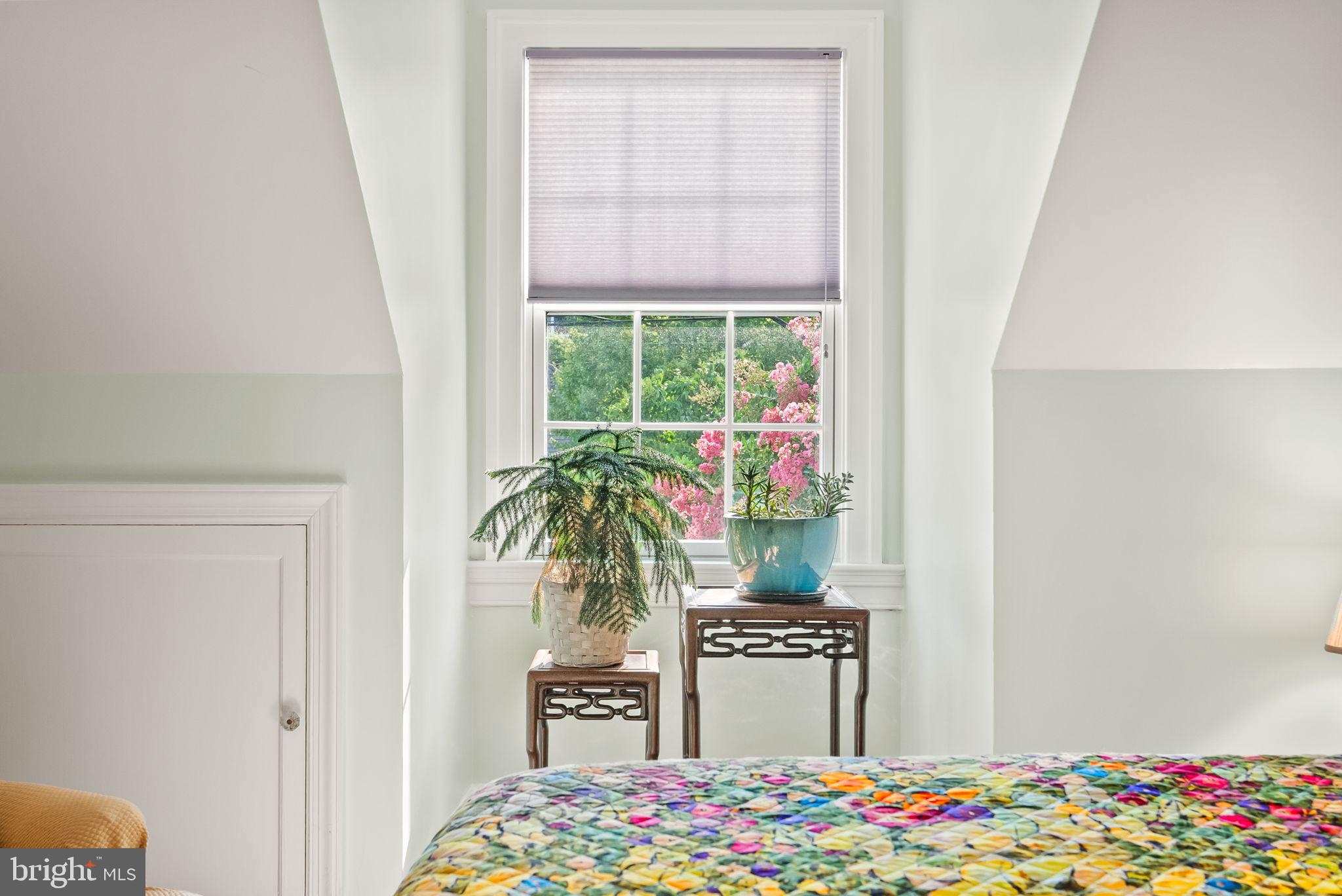 1703 Russell Road Alexandria, VA 22301 - Photo 32 of 42 a bed room with a bed and a window