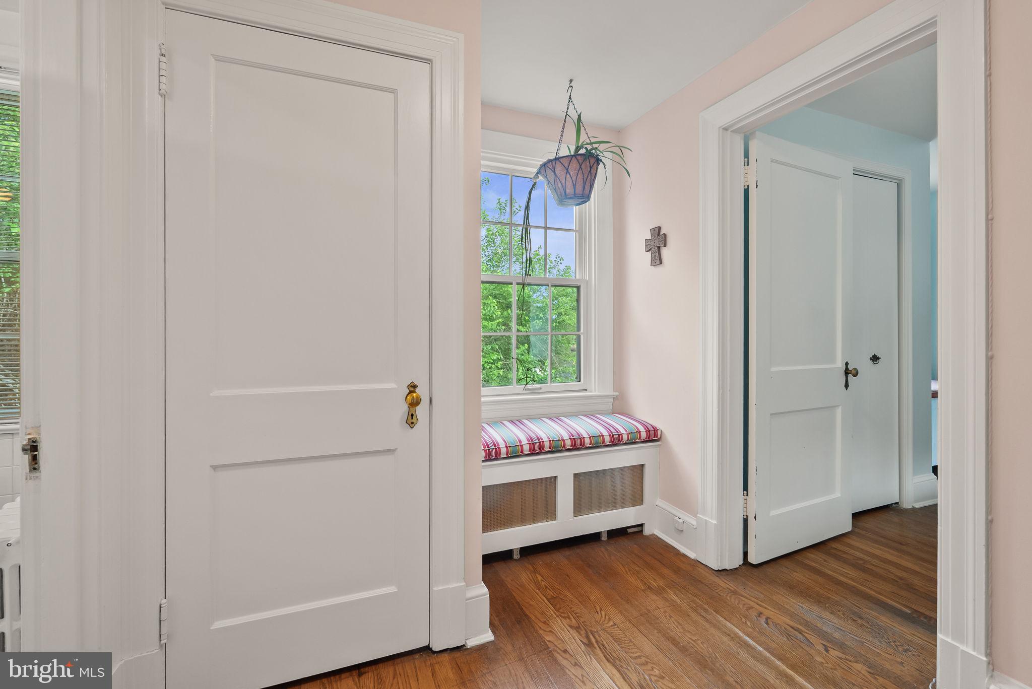 1703 Russell Road Alexandria, VA 22301 - Photo 33 of 42 a room with a window and wooden floor