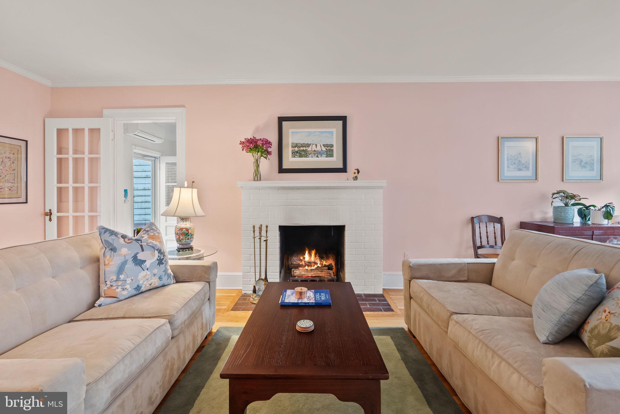 1703 Russell Road Alexandria, VA 22301 - Photo 5 of 42 a living room with furniture and a fireplace