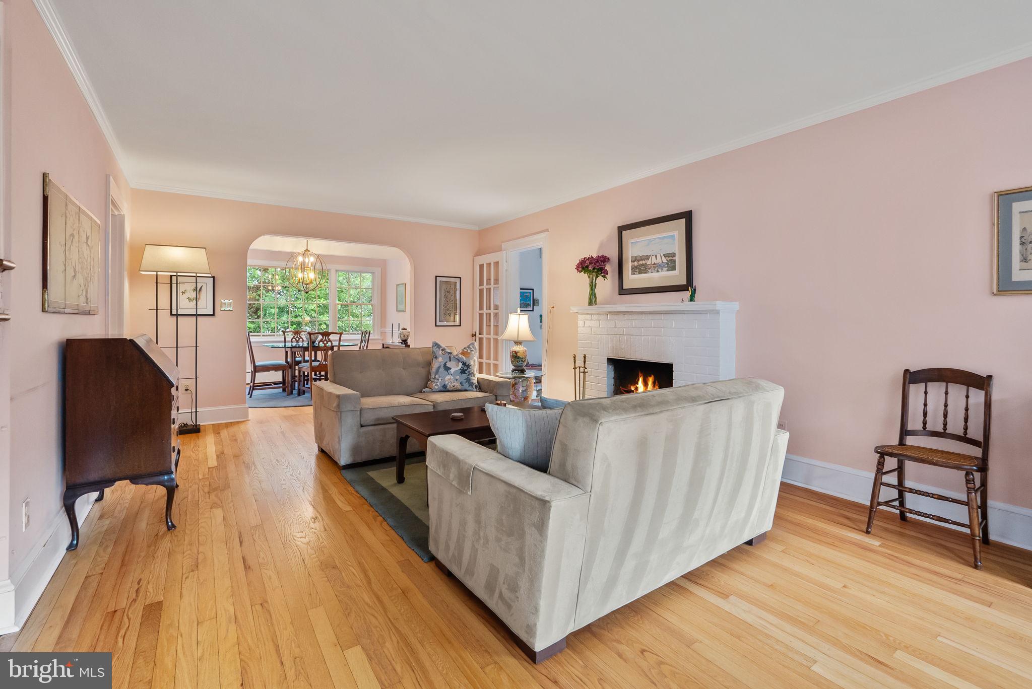 1703 Russell Road Alexandria, VA 22301 - Photo 6 of 42 a living room with furniture and a fireplace