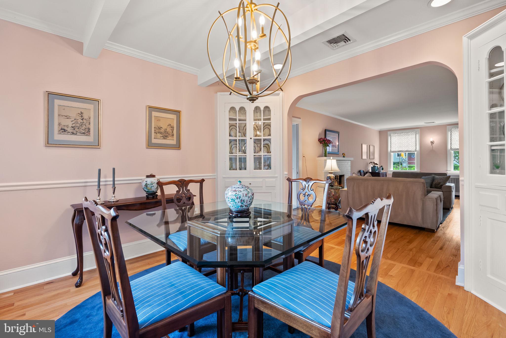 1703 Russell Road Alexandria, VA 22301 - Photo 10 of 42 a view of a dining room with furniture and wooden floor