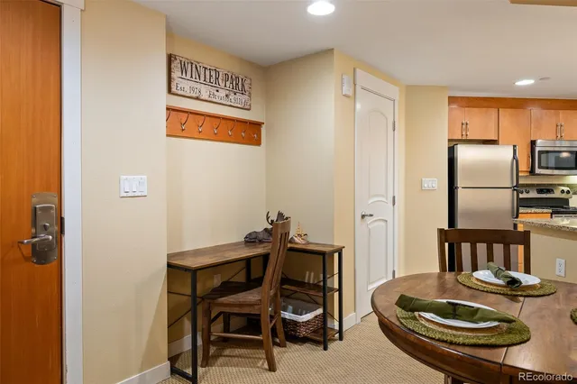 a table and chairs in a kitchen