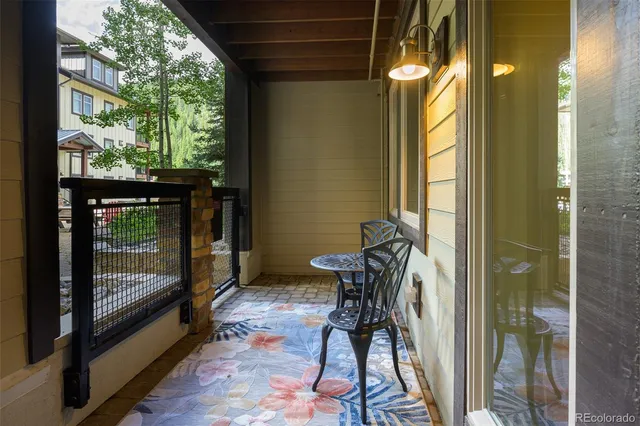 a balcony view with a outdoor seating space