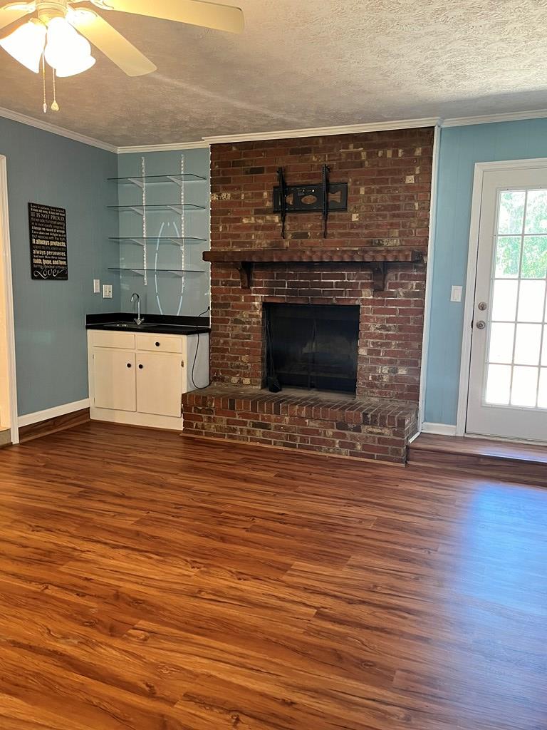 5705 Old Dominion Road Columbus, GA 31909 - Photo 9 of 24 Wet bar and wood burning fireplace