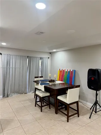 a kitchen with stainless steel appliances granite countertop a stove sink and cabinets