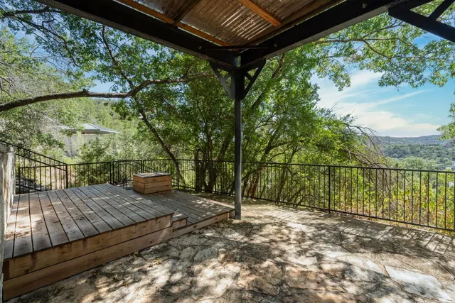 a view of a outdoor space with chairs and couch
