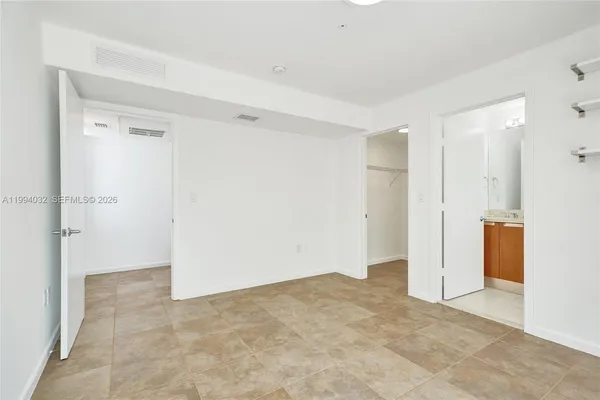 a bathroom with a shower and a toilet