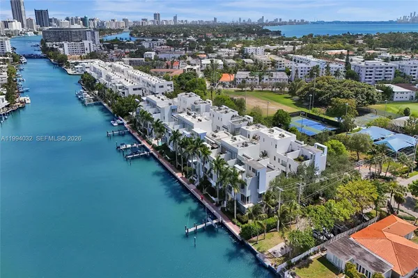 an aerial view of residential house with outdoor space and river