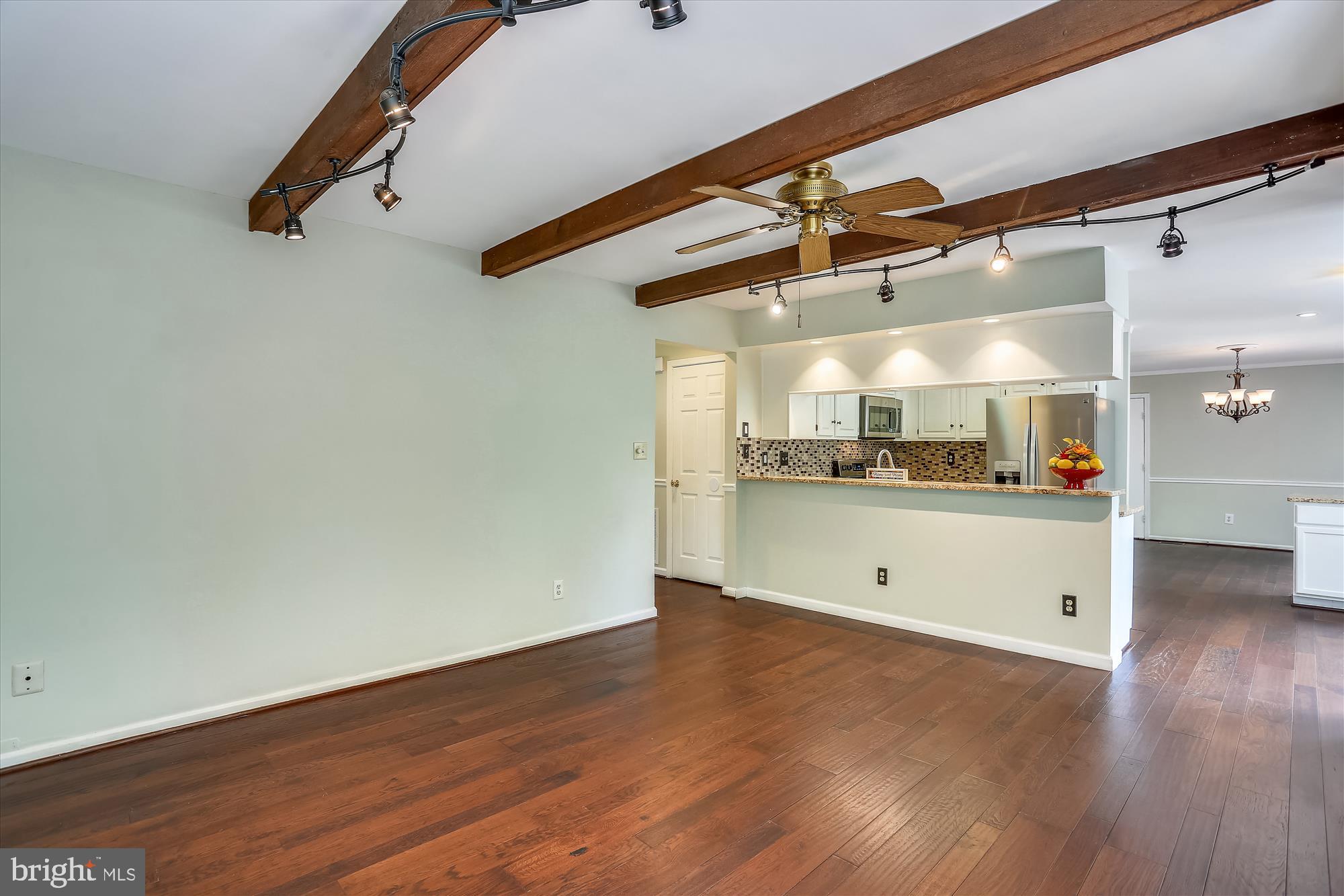 8908 Spring Berry Court Gaithersburg, MD 20886 - Photo 15 of 59 Hardwood floors throughout main level