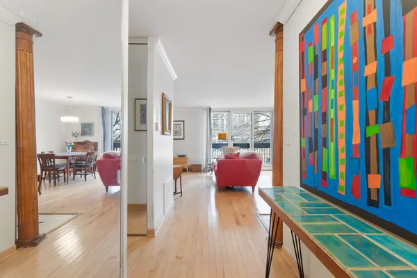 a view of a living room and dining room